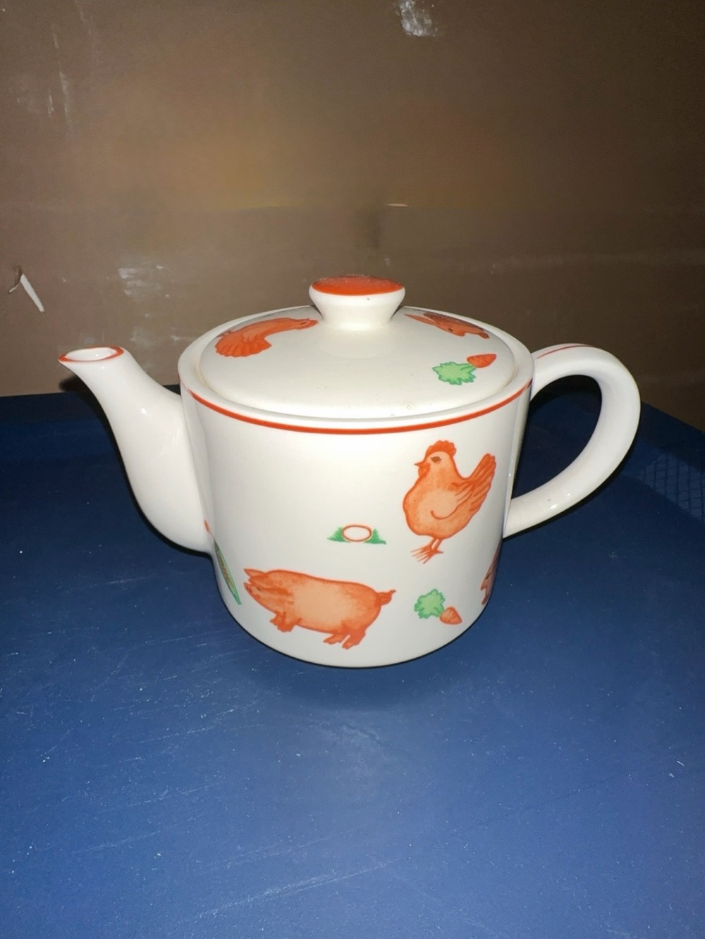 White Ceramic Teapot with Orange Farm Animal Motif